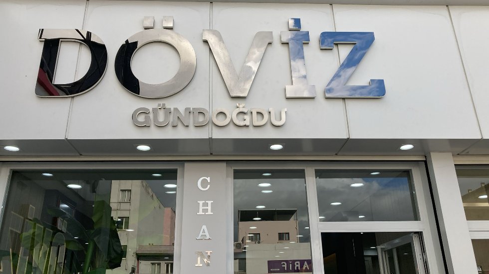 Gündoğdu Döviz ve Altın company logo with the company name GÜNDOĞDU DÖVİZ VE ALTIN SINIRLI YETKİLİ MÜESSESE AŞ in bold letters on a clean light background, conveying a sense of professionalism and trust in a financial services context